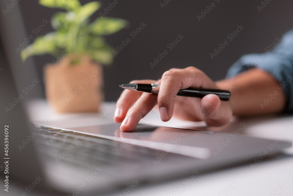 Poster businessman operate on the table being checking data office desk background