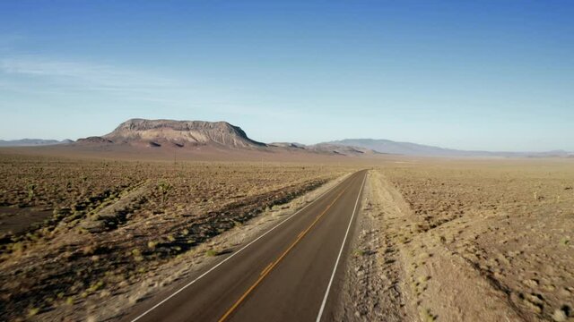 Aerial: Desert road in the wild. Goldfield, Nevada, USA