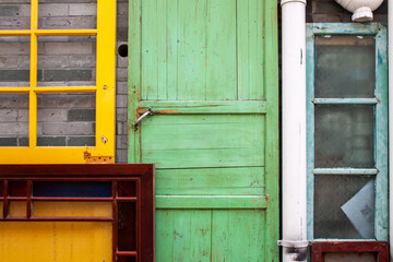Colorful antique wooden doors and windows, art installations, background, copy space