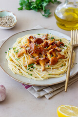 Pasta spaghetti with mushrooms chanterelle and parmesan cheese. Healthy eating. Vegetarian food. Italian food.