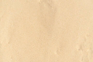 Fototapeta na wymiar Sand texture background. Brown desert pattern from tropical beach.