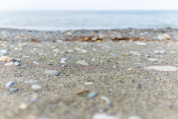 Fototapeta na wymiar Abstract background of a sea of waves sand stones.