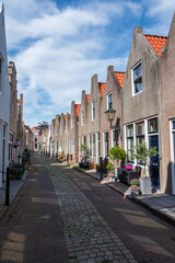 Obraz premium Walking in old Dutch town Zierikzee with old small houses and streets