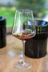 Tasting of dry burgundy red wine made from pinot noir  grapes, wine tourisme to Burgundy Cote de Nuits wine region, France