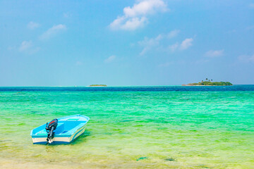 Boats boat trip Rasdhoo island Maldives in beautiful clear water.