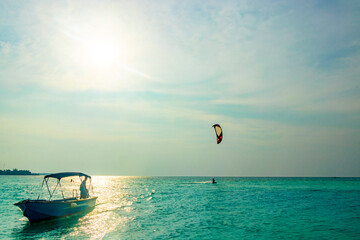 Boats boat trip Rasdhoo island Maldives sunset and clear water.
