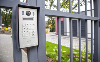 Video intercom on the gate at the entrance to the residential area. Electronic intercom to a...