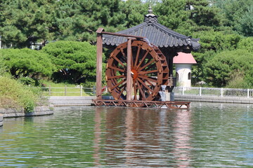 Korean Traditional Wooden Water Wheel in Central Park Songdo, Incheon, South Korea