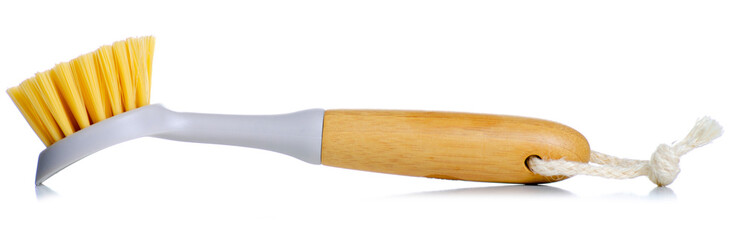 Cleaning brush with wooden handle on white background isolation