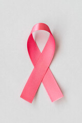 pink bow from the breast cancer prevention campaign. pink October