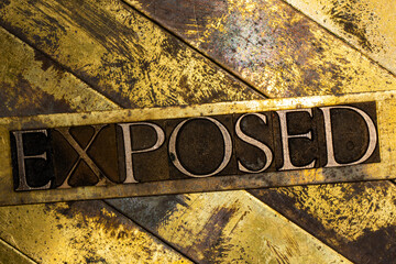 Exposed text on vintage textured copper and gold background