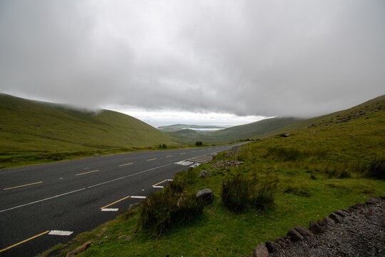 View of a mauntain road in stormy wether condition.