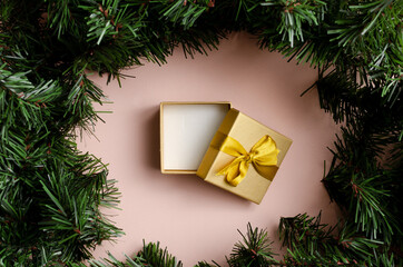 Christmas composition. Christmas gifts, pink decorations on pastel pink background. Flat lay, top view, copy space