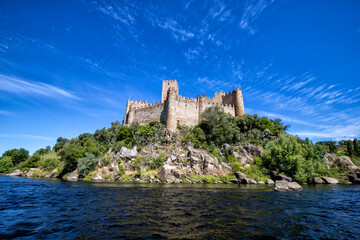 A view of the beautiful Almourol Castle located on a small island on the middle of the Tagus river, Portugal.