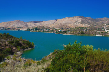 Fototapeta na wymiar Scenic landscape shot of Germasogeia dam in Cyprus on a beautiful blue sky day.