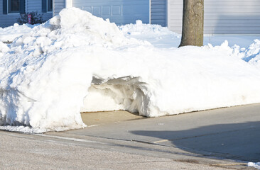 Cave in Snow Pile