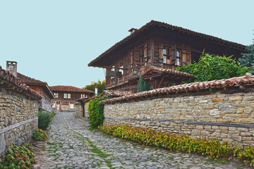 Fototapeta na wymiar Old houses and streets in a traditional village in Bulgaria