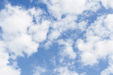 Blue Spring Sky with Fluffy Clouds