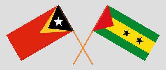 Crossed flags of East Timor and Sao Tome and Principe. Official colors. Correct proportion