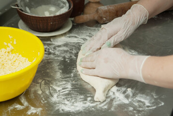 Cook makes georgian food khinkali.	