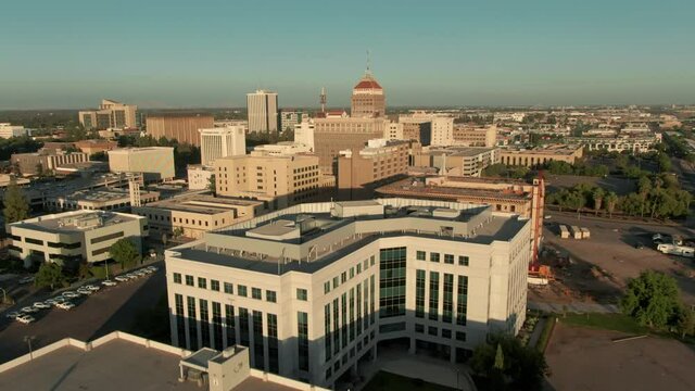 Aerial: Fresno city skyline at sunset. California, USA