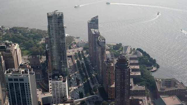 New York City, New York United States - August 29 2021: Traffic in upper Manhattan with buses, cars, trucks, and boats.  Video timelapse sped up by a factor of 4 times.
