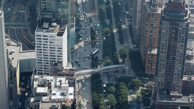 New York City, New York United States - August 29 2021: Traffic jam in an upper Manhattan intersection with buses, cars, and trucks. Video timelapse sped up by a factor of 8 times.