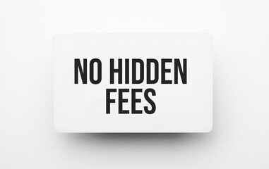 NO HIDDEN FEES sign on notepad on the white backgound