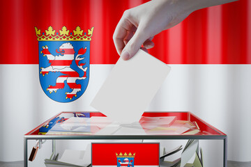 Hesse flag, hand dropping ballot card into a box - voting/ election in Germany concept - 3D illustration - obrazy, fototapety, plakaty
