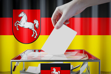 Lower Saxony flag, hand dropping ballot card into a box - voting/ election in Germany concept - 3D illustration - obrazy, fototapety, plakaty