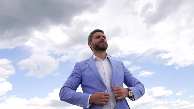 free inspired man unbuttoned jacket feeling success, freedom