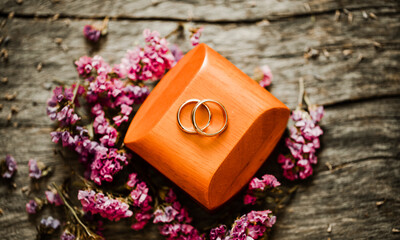 wedding rings and flowers