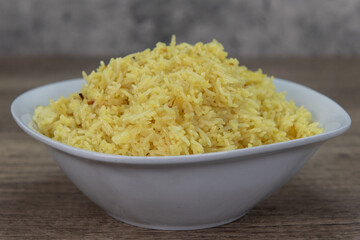 Delicious side dish of biryani rice from Indian restaurant cooked and seasoned perfectly.