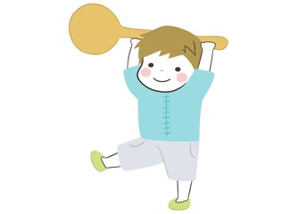 笑顔でスプーンを運びごはんの準備をするかわいい男の子