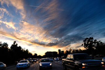 Freeway commuter traffic in Los Angeles at sunset