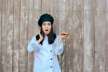 Funny Female Chef Holding a Delicious Gourmet Burger