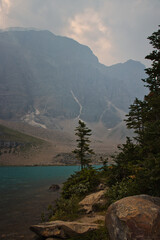 Moraine Lake in Banff National Park covered by smoke from forest fires