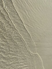 The sea was blown up on the beach.