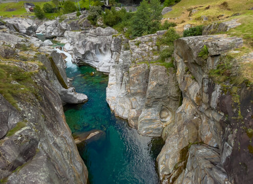Riverbed with  clear emerald green water in Canyon