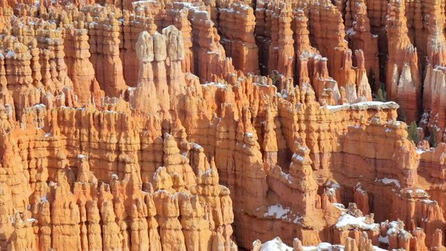 Hoodoos of Bryce Canyon National Park in winter covered with snow seen from Inspiration Point