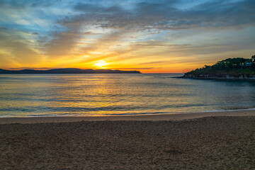 High Cloud Sunrise Seascape with Soft Shades of Colour