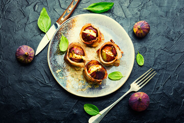 Figs roasted in bacon with cheese