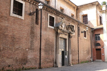 Fototapeta na wymiar Trastevere District San Crisogono Church Exterior in Rome, Italy