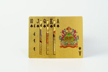 Golden playing cards isolate on white background. Close up of  playing cards set.