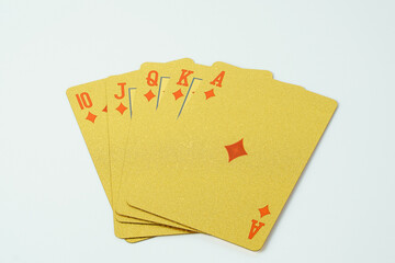 Golden playing cards isolate on white background. Close up of  playing cards set.