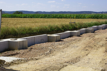 construction site with edge foundations in an industrial area