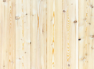 Pine boards with knots and a pronounced texture.
