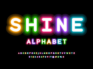 Glowing neon light alphabet design with uppercase, numbers and symbol