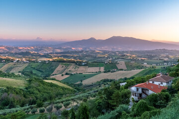 Fototapeta na wymiar Beautiful sunset on the countryside of Marche in a summer evening