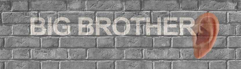 Big brother is listening concept - grey coloured wide brick wall with an ear on the right side and the words BIG BROTHER with copy space beneath 
